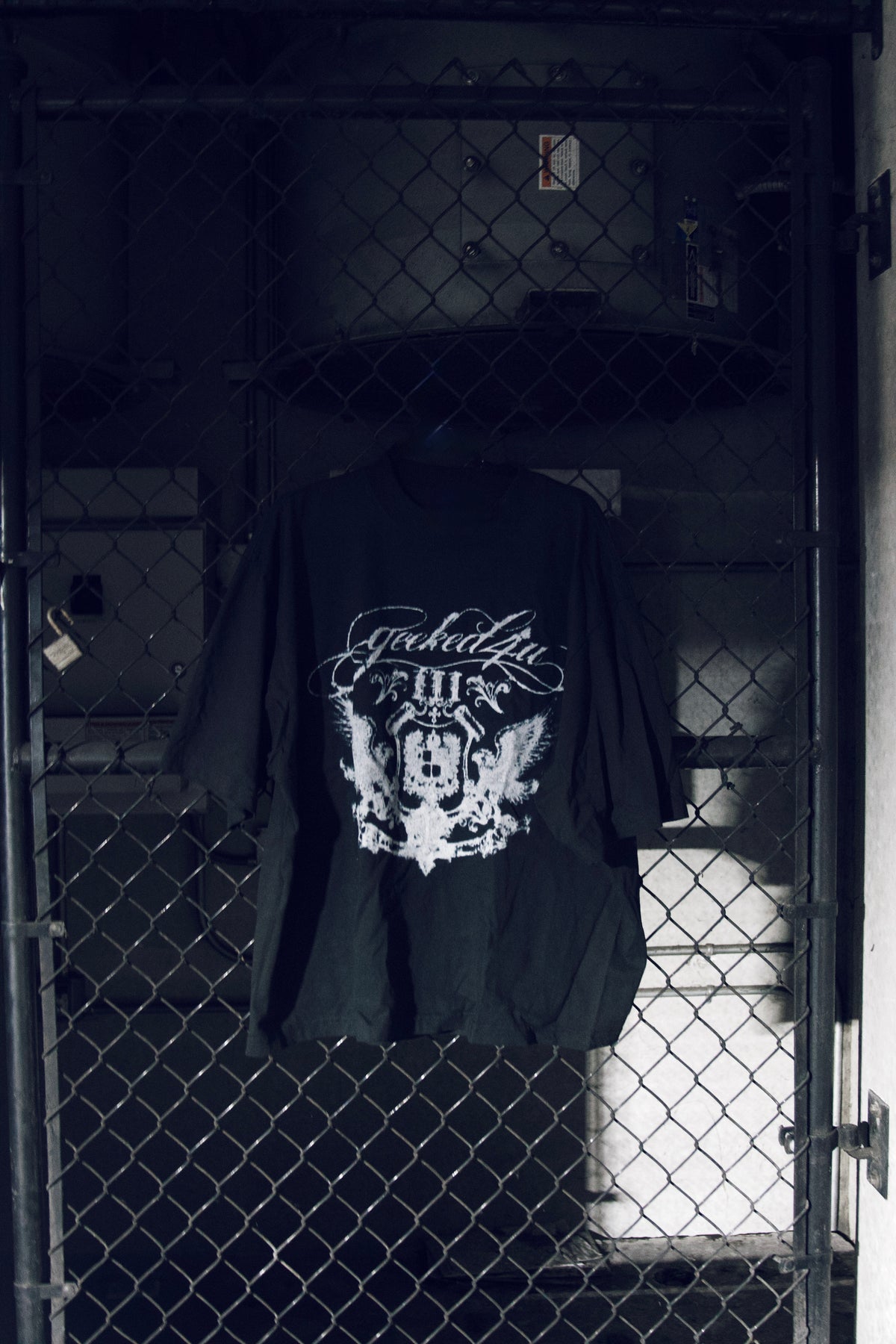 signature script oversized black T