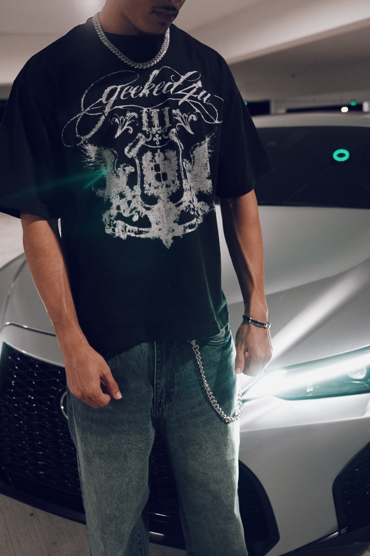 signature script oversized black T